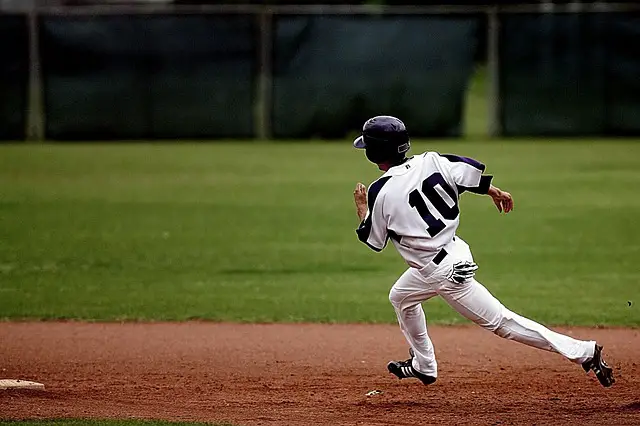 baseball runner wearing cleats