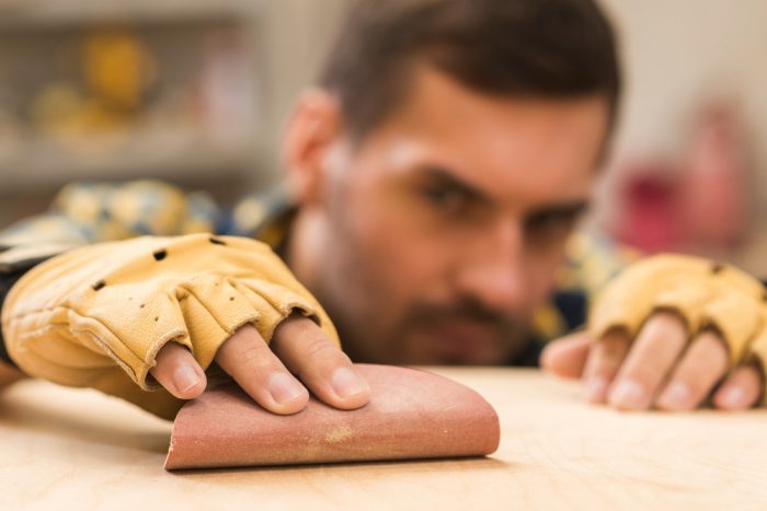 Use sandpaper on your helmet before painting it