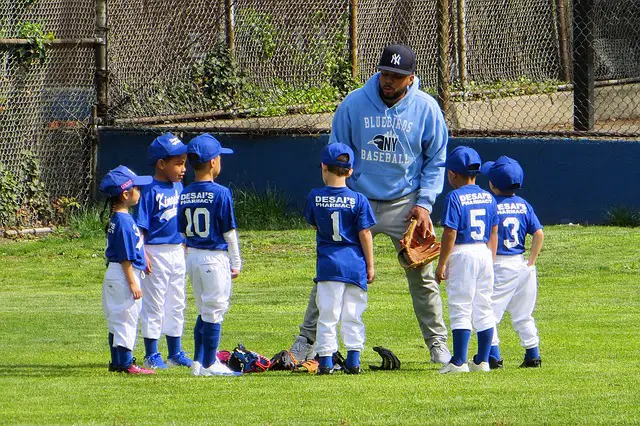 Team practice with baseball pitchback