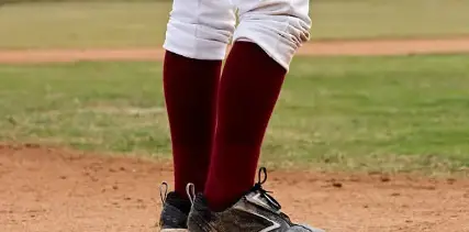 how to tuck in baseball pants into socks 